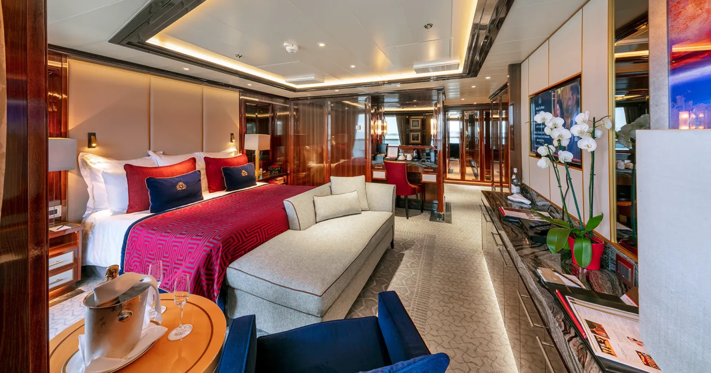 A Queens Grill suite bedroom on a Cunard ship