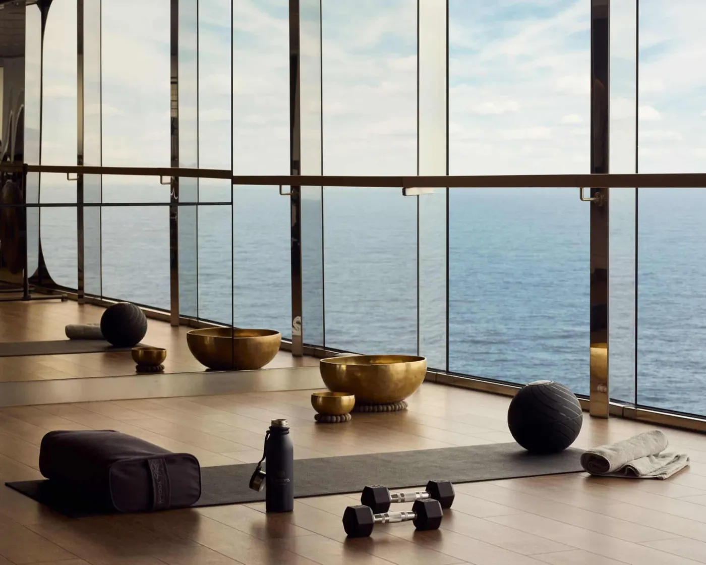 A wellness studio with sea views on an Explora Journeys ship